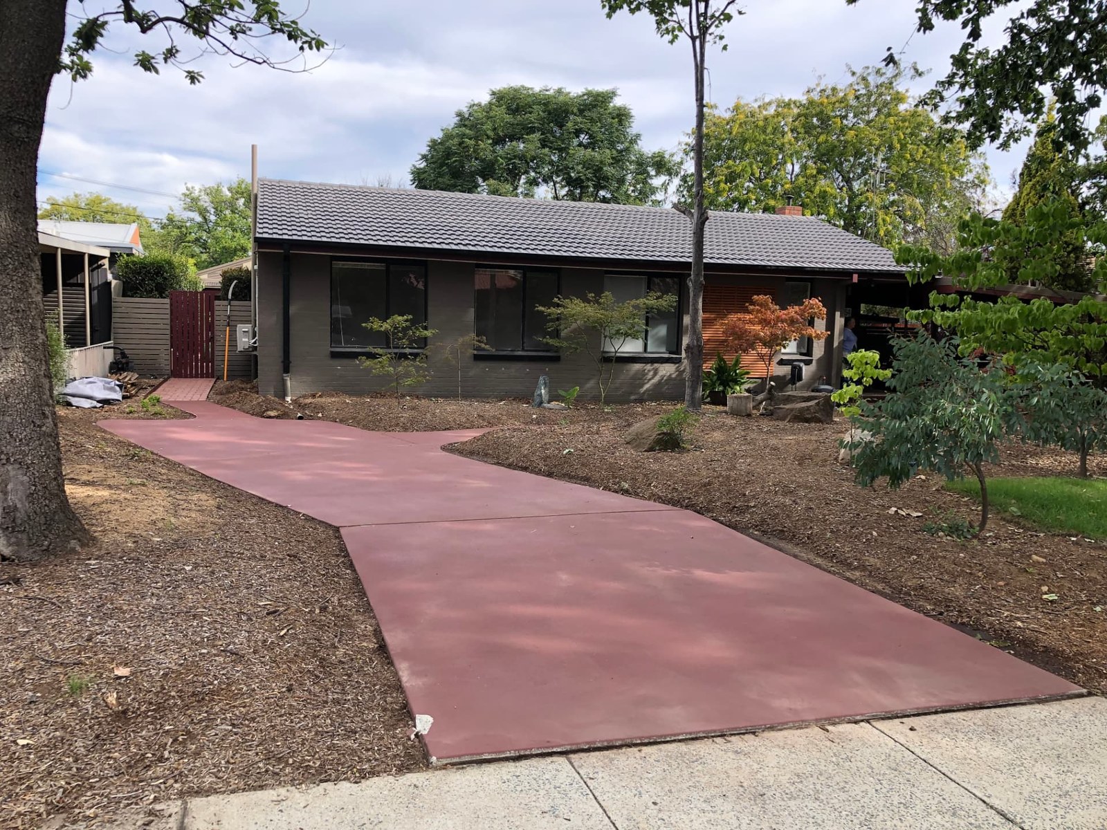Cleaned coloured concrete driveway at an inner south Canberra home